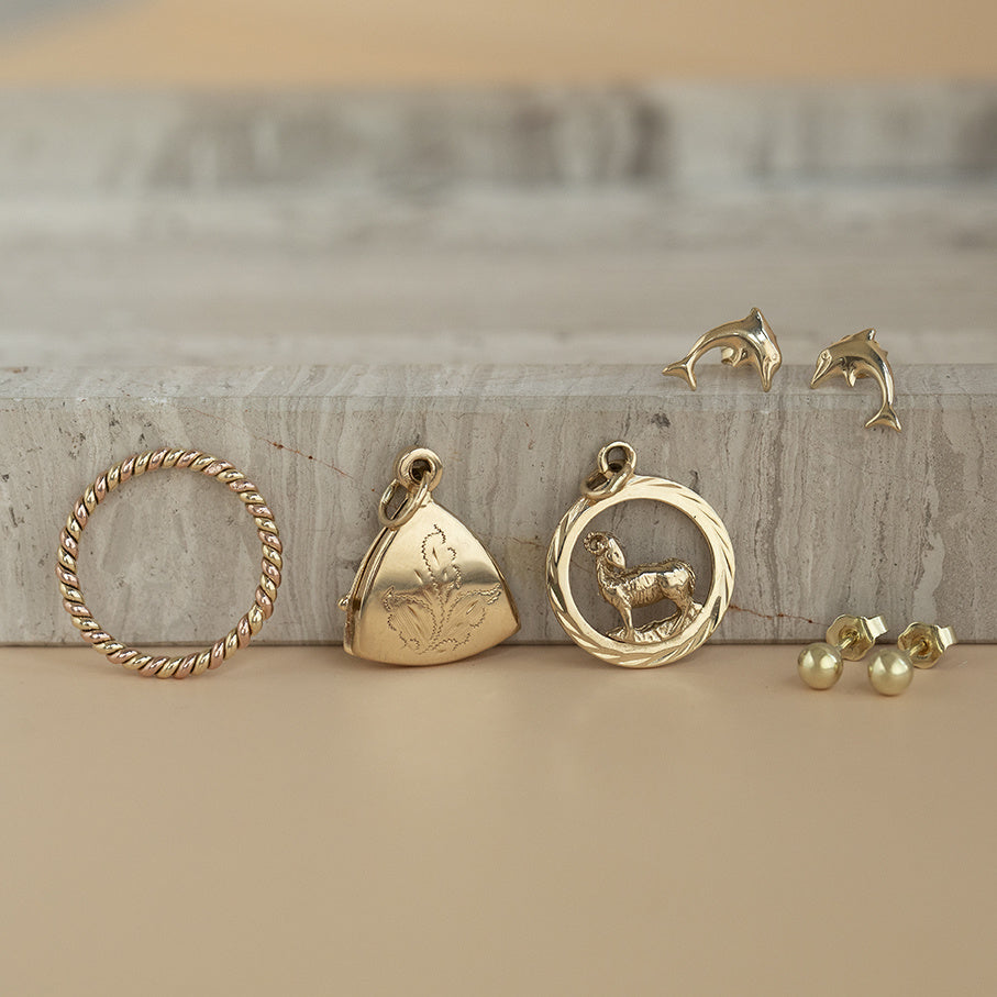 Golden zodiac pendant Aries 14 karat