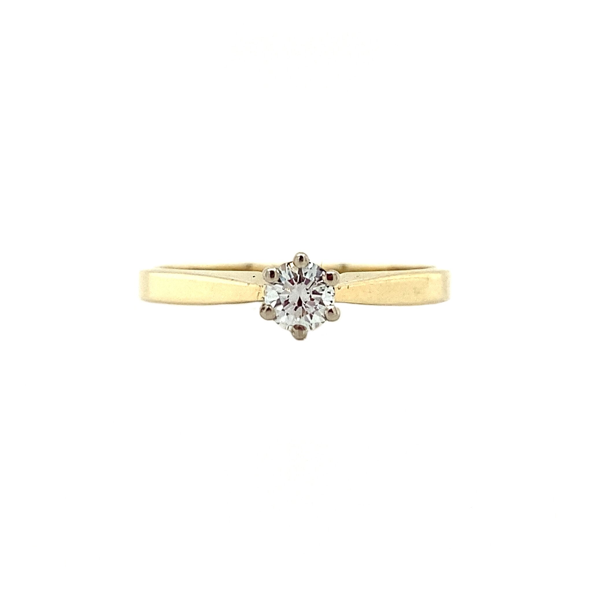 Gouden solitair ring met diamant 14 krt