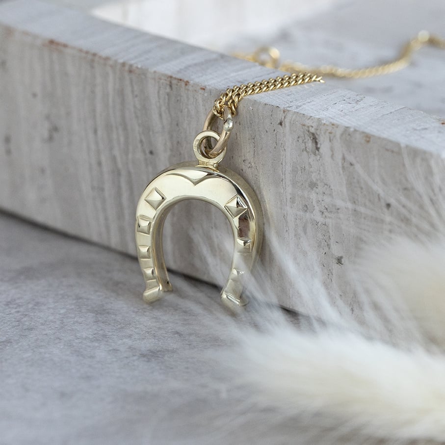 Gold horseshoe pendant 14 karat