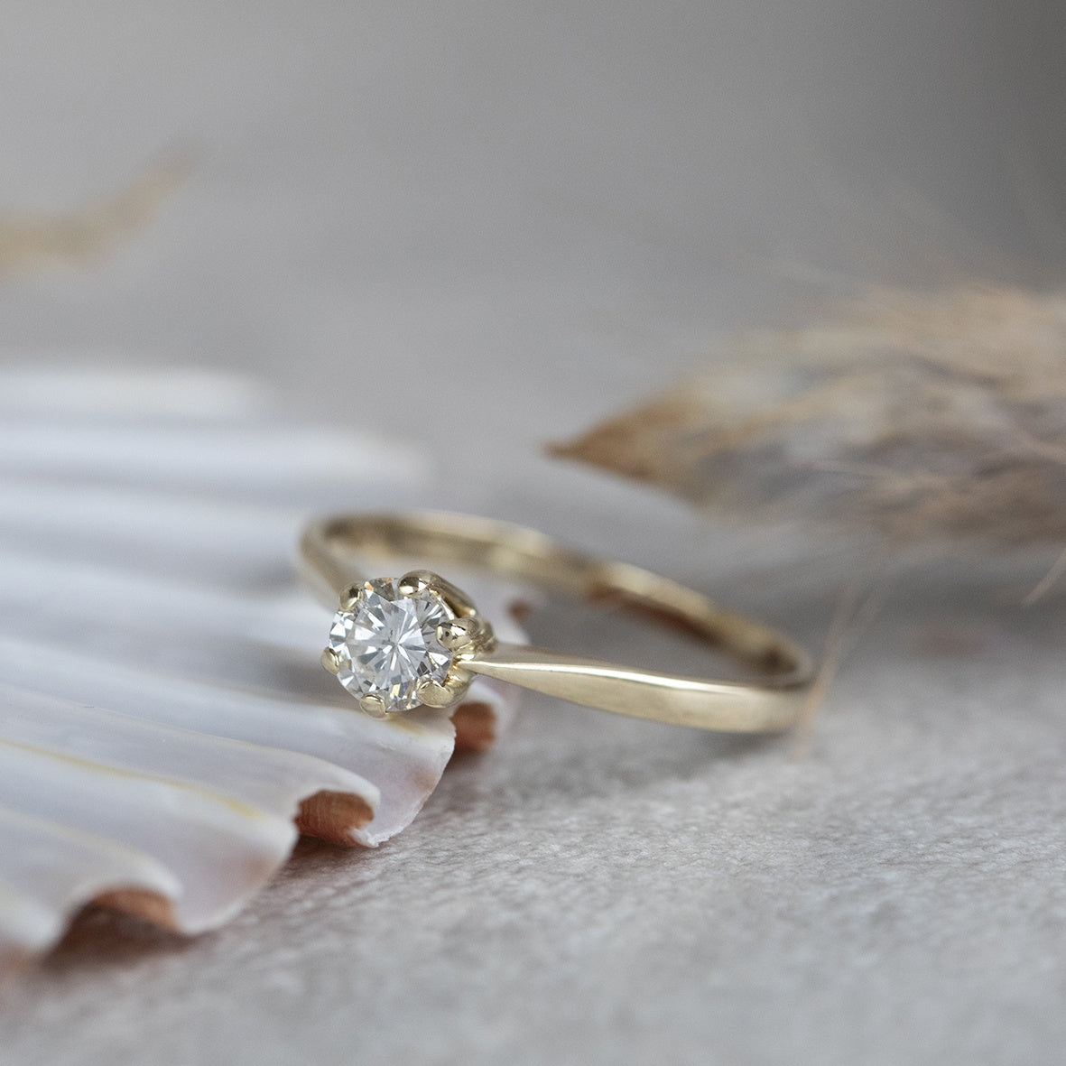 Gouden solitair ring met diamant 14 krt