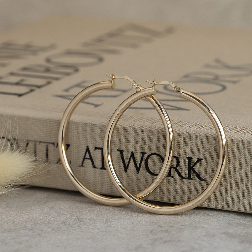 Gold smooth earrings 14 karat