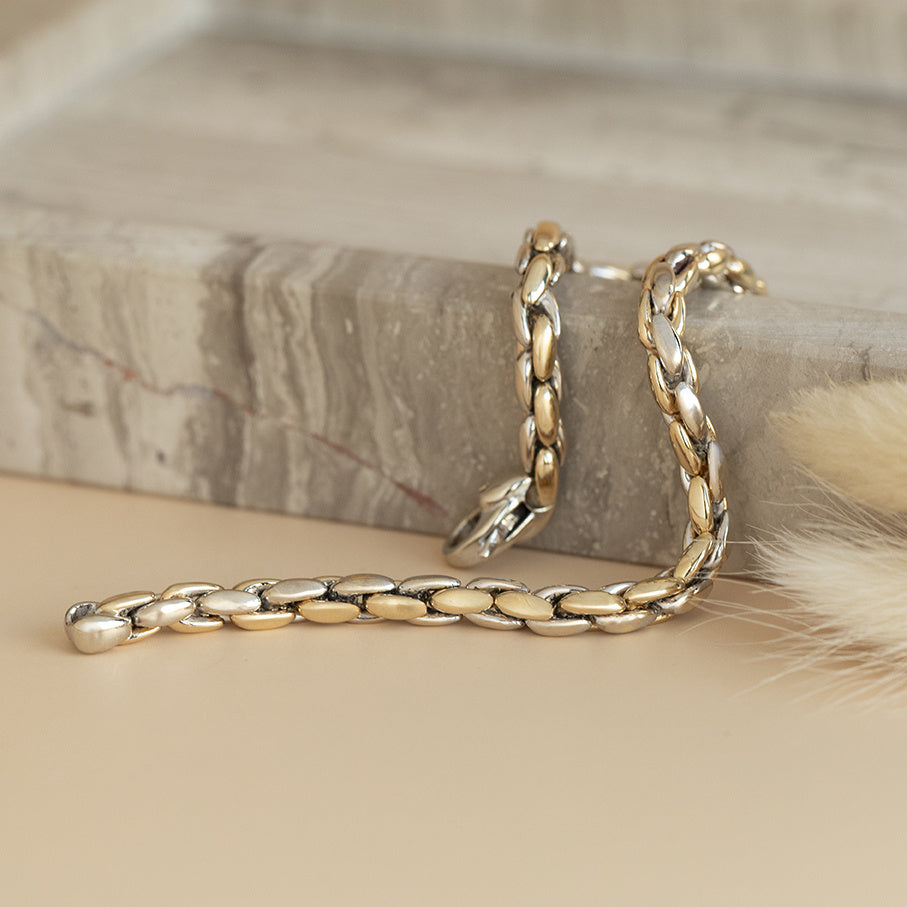 Golden bracelet bicolour 19 cm 14 karat