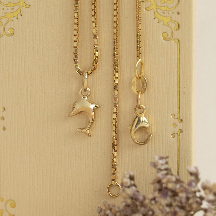 Golden dolphin pendant 14 karat