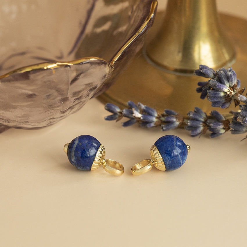 Gouden creoolhangers met lapis lazuli 14 karaat