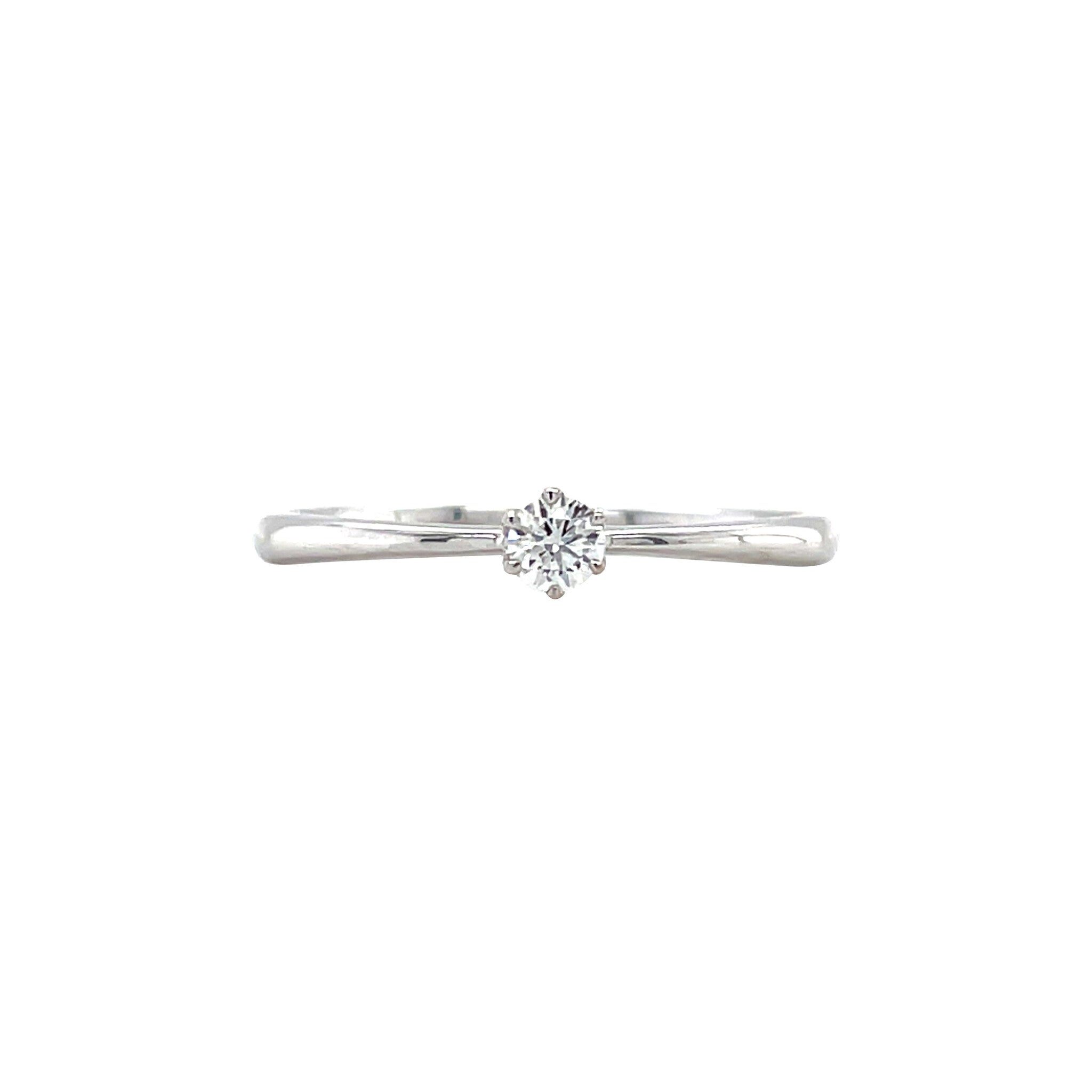 White gold solitaire ring with diamond 14 kt