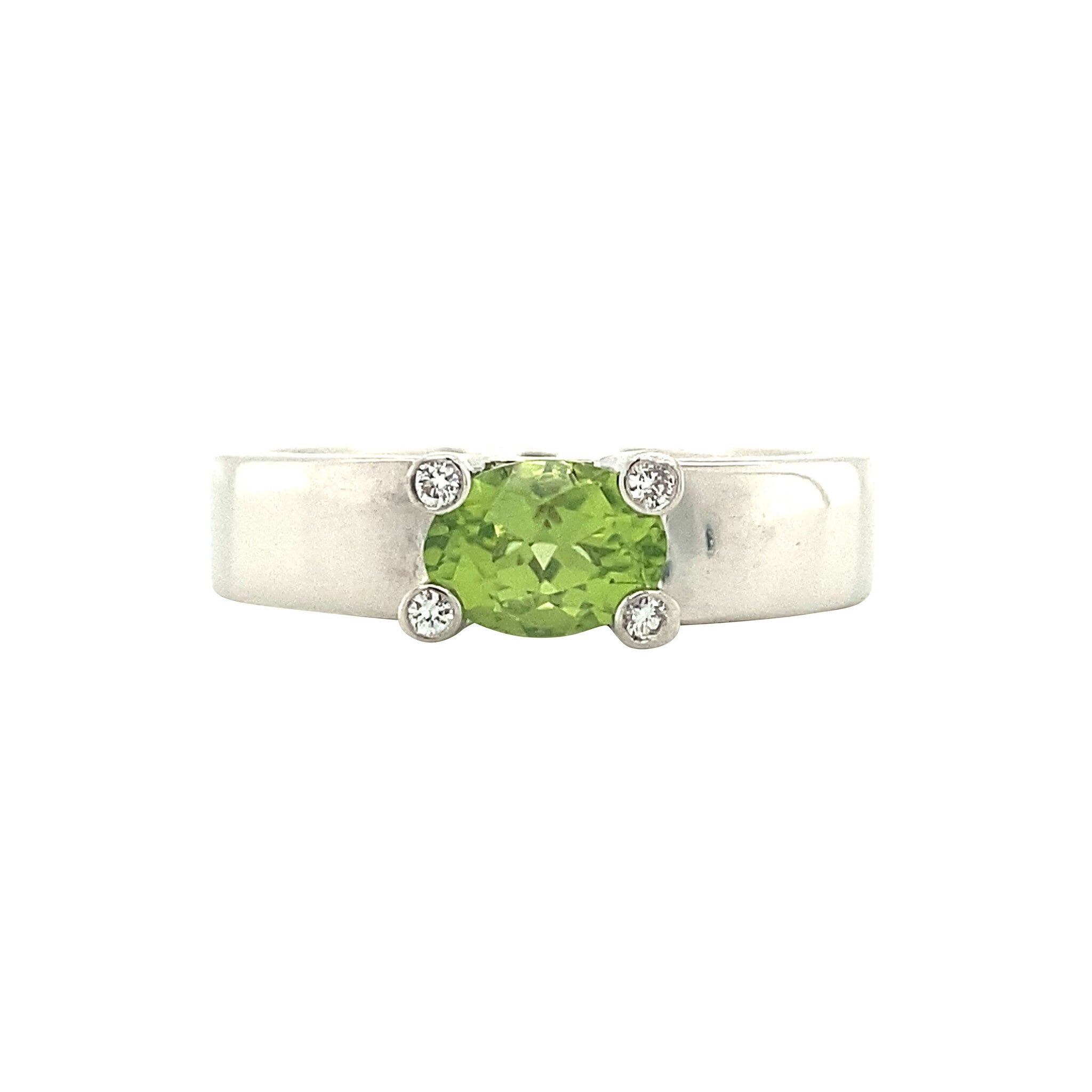 White gold ring with peridot and diamond 14 karat