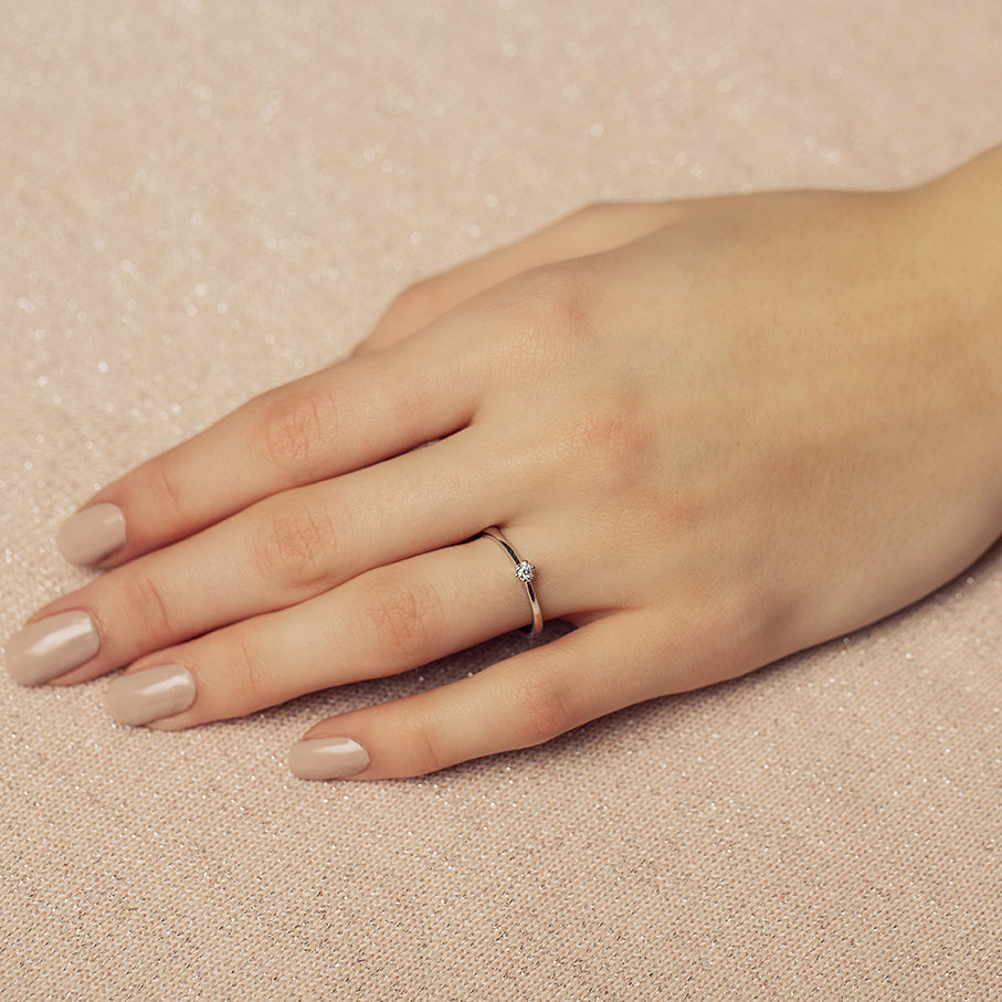 White gold solitaire ring with diamond 14 kt