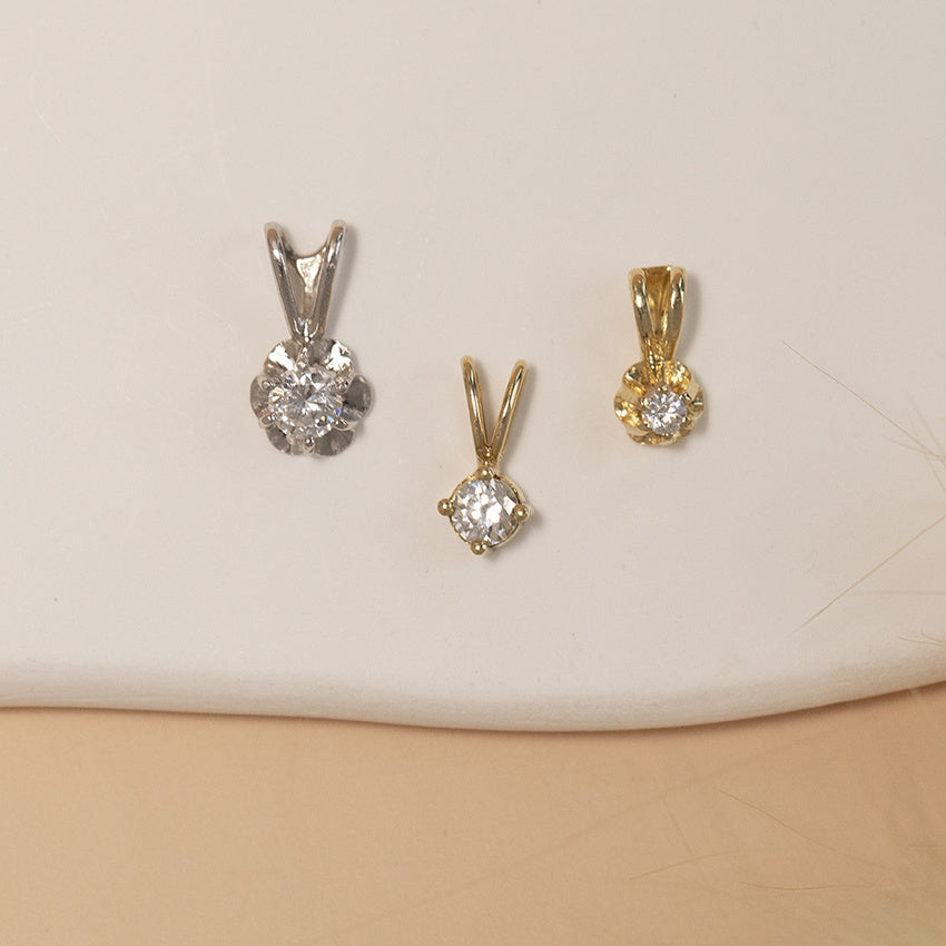 Gold solitaire pendant with zirconia 14 karat