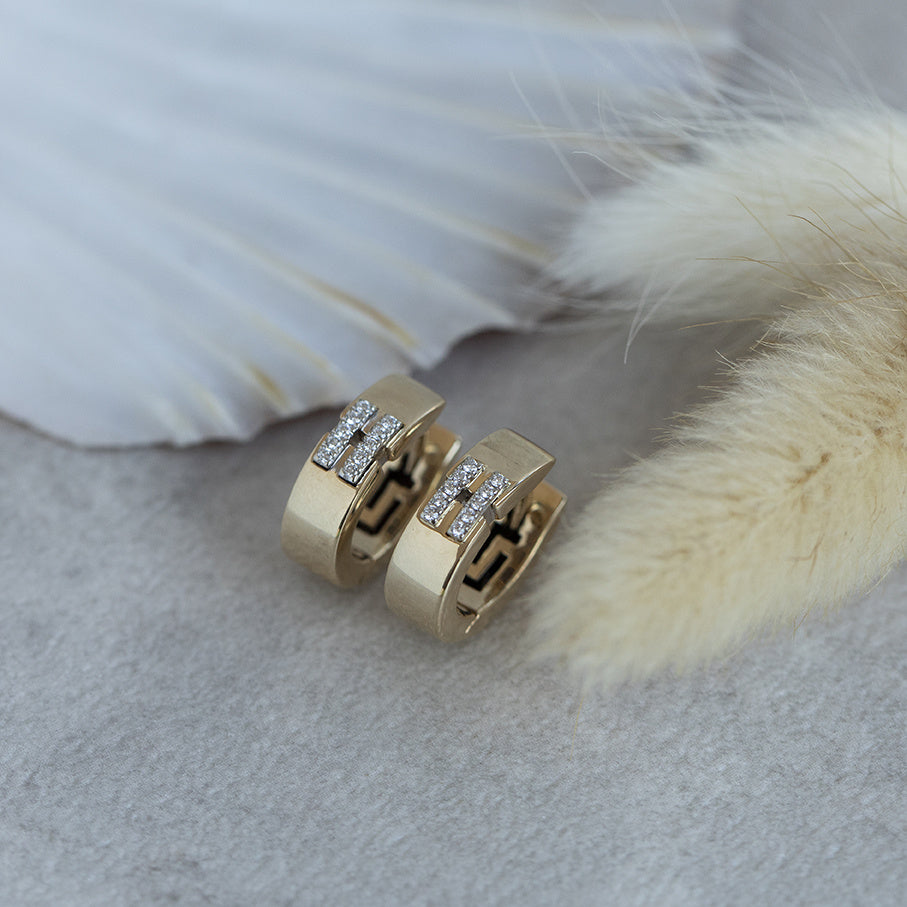 Gold hinged hoop earrings with diamond 14 karat