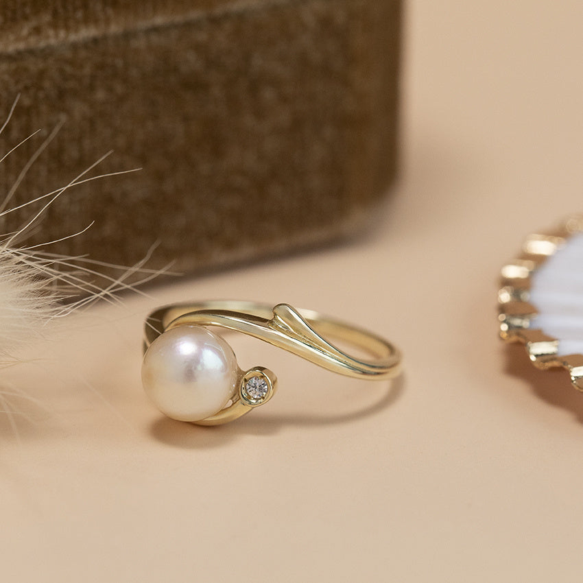 Gold ring with pearl and zirconia 14 karat